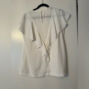 Hugo Boss pre owned top. Used few time. Without tag . Size 8 .